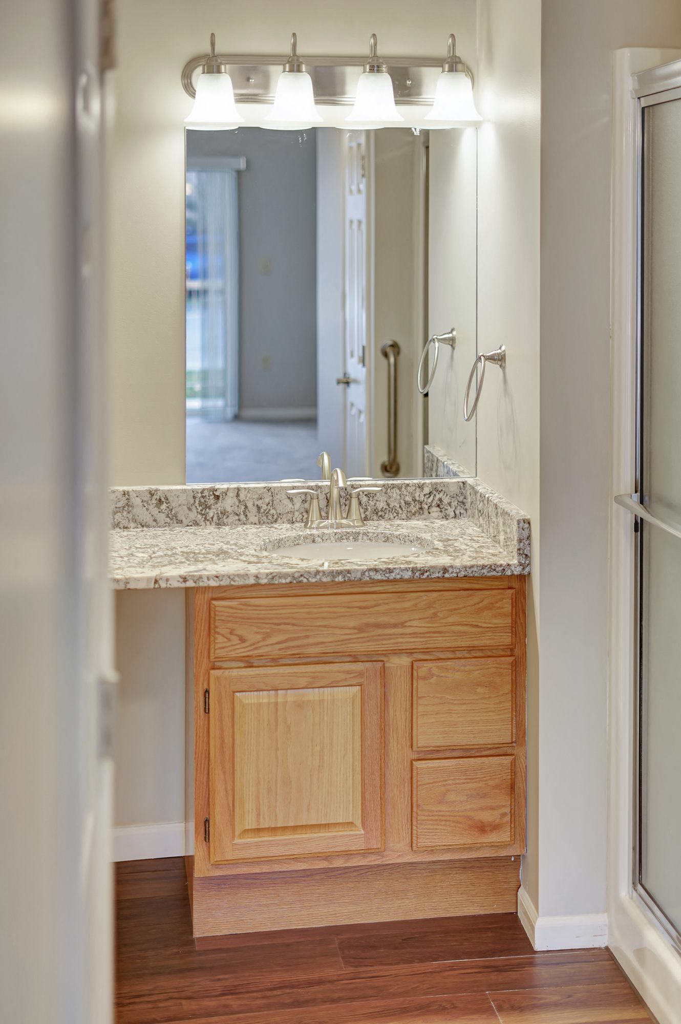 a bathroom with a sink and a mirror